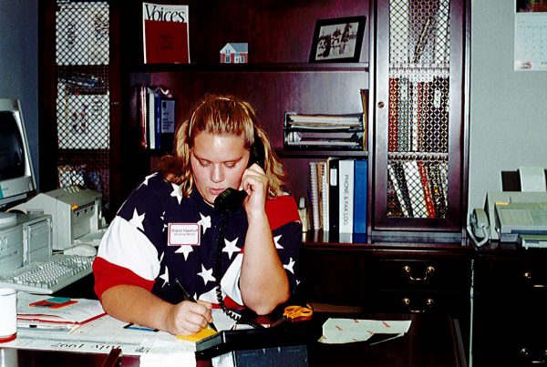 Sharon Haselhoff answering the phone in July 1997 at the Catt Center.