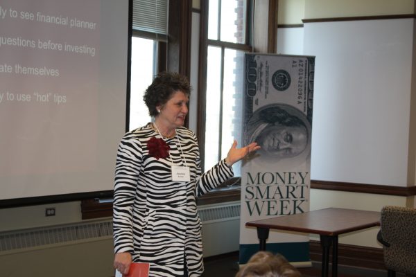 Joanne Kuster speaking at her breakout session, "Avoiding the Retirement Gap: Strategies to Build Your Net Worth."