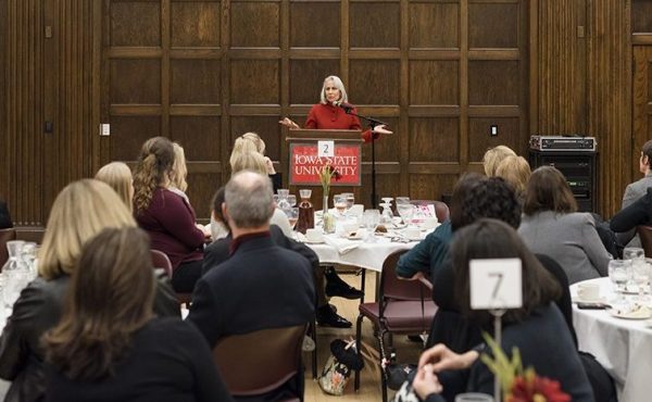 Lynn Povich answers a question during a private dinner before her public lecture.