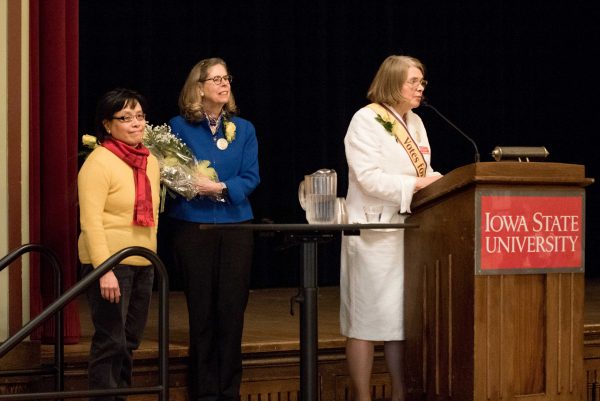 ISU president Wendy Wintersteen (center) and Catt Center director Karen Kedrowski (right) thank Tin-Shi Tam for her carillon concert.