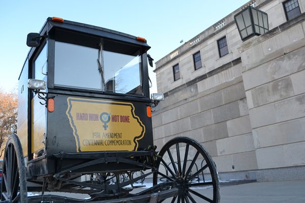 Replica suffrage wagon parked outside the Memorial Union.