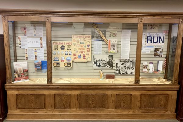 Photo of the display case on third floor Catt Hall, with displays highlighting Catt Center programming, research, and students